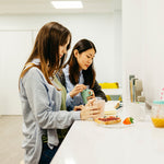 Employees snacking on pastries at work